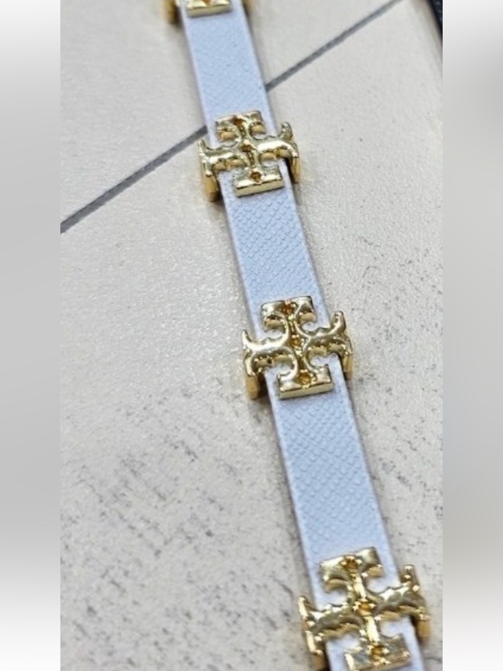 T logo Leather belt Bracelet in white with Gold Accents